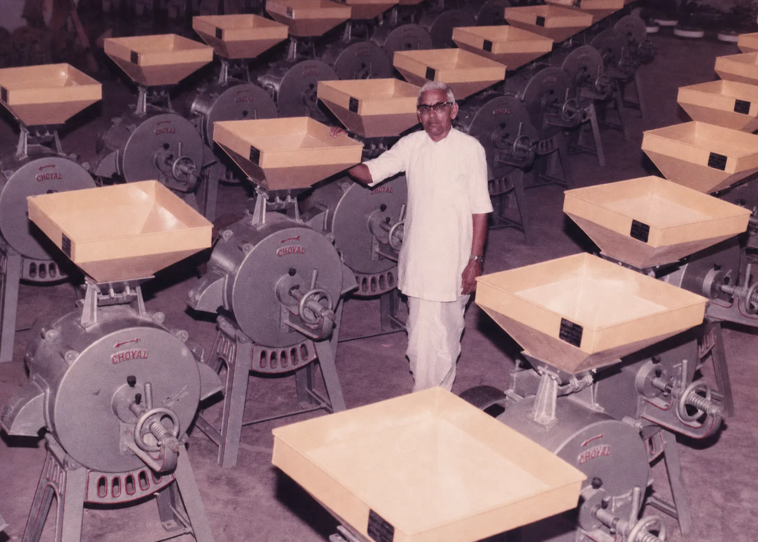 Choyal founder on the early flour-mill production floor in Ajmer